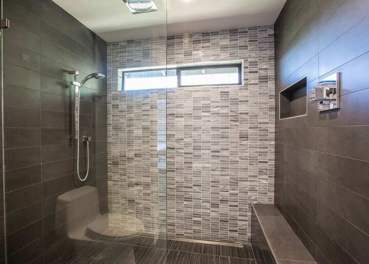  A walk-in shower installation gives styles and functionality to a Grand Junction, CO bathroom.